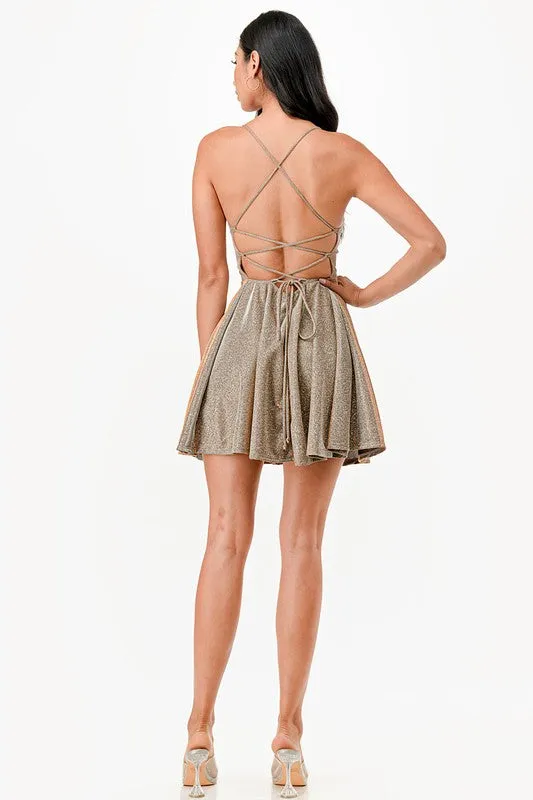 Glittered fit and flare dress with back crisscross spaghetti
