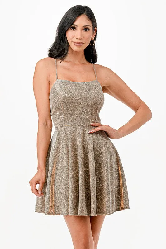 Glittered fit and flare dress with back crisscross spaghetti