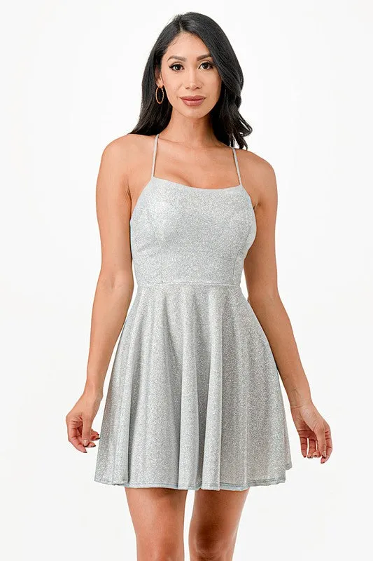 Glittered fit and flare dress with back crisscross spaghetti