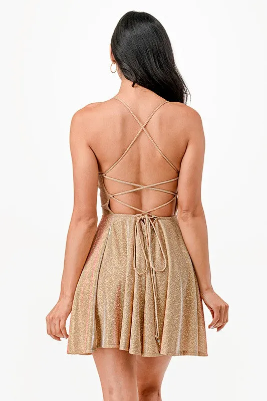 Glittered fit and flare dress with back crisscross spaghetti