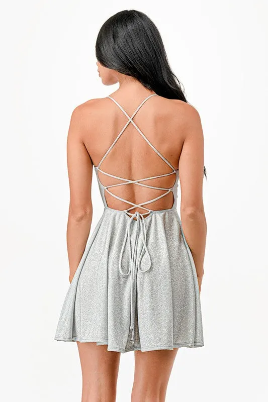 Glittered fit and flare dress with back crisscross spaghetti