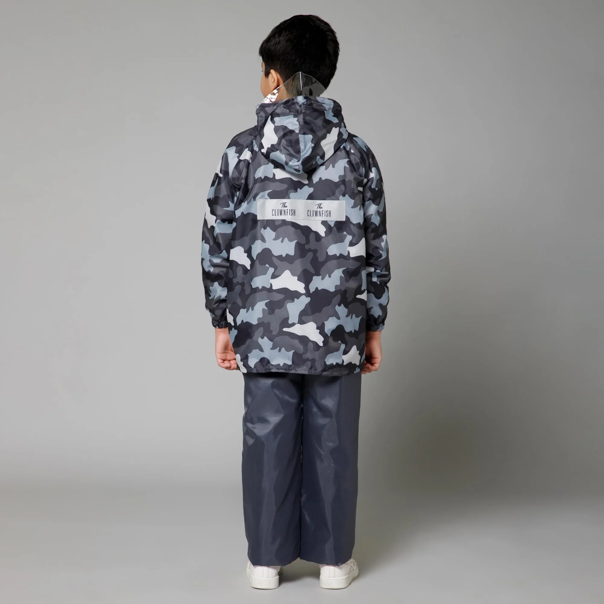 THE CLOWNFISH Comrad Series Kids Waterproof Nylon Double Coating Reversible Raincoat with Hood and Reflector Logo at Back. Set of Top and Bottom. Printed Plastic Pouch. Kid Age-8-10 years(Grey Camo)